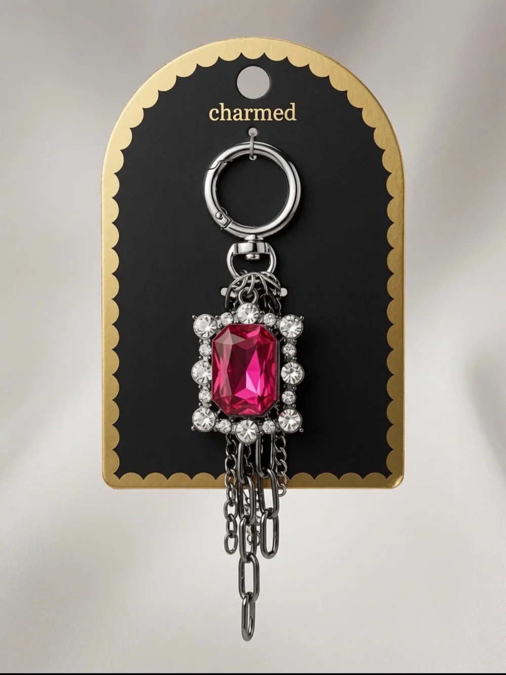 Charmed Silver-Tone Bag Charm Key Ring with Fuchsia Gem Accent